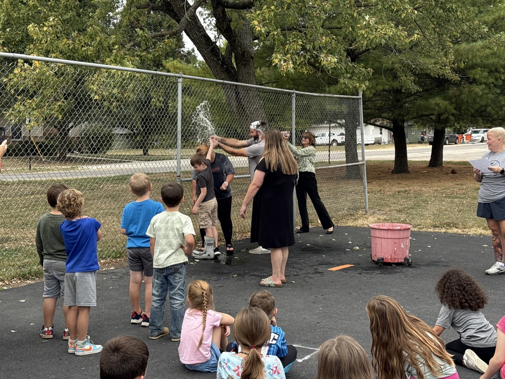 Doc throwing water balloon
