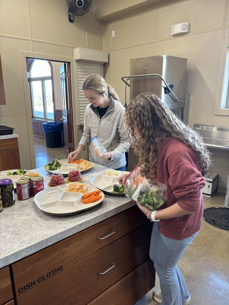 students setting up relish trays 