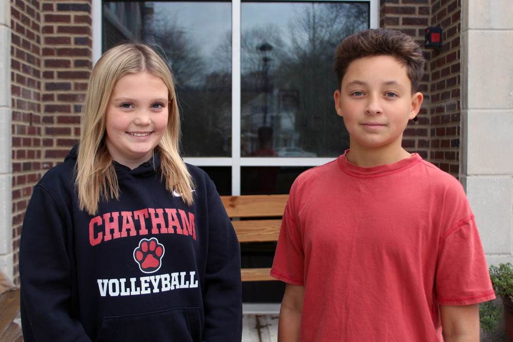 girl and boy smiling