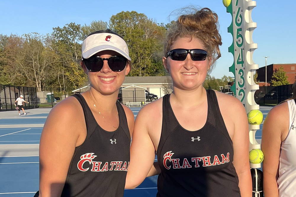 two girls in chatham uniforms smiling