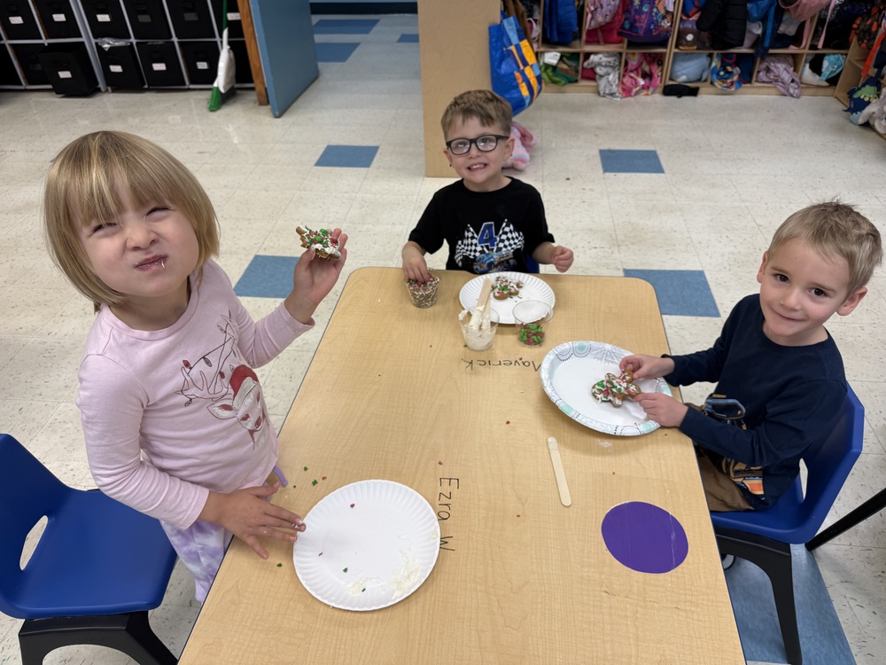 students eating ginger bread cookies