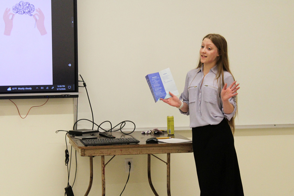 young woman giving presentation