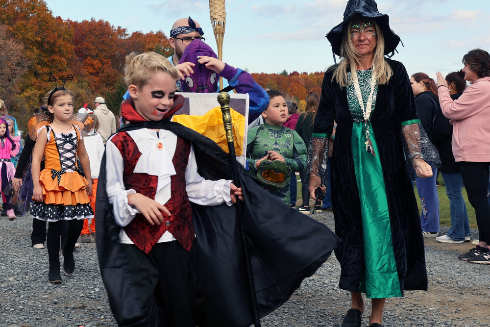 student dressed as vampire in parade