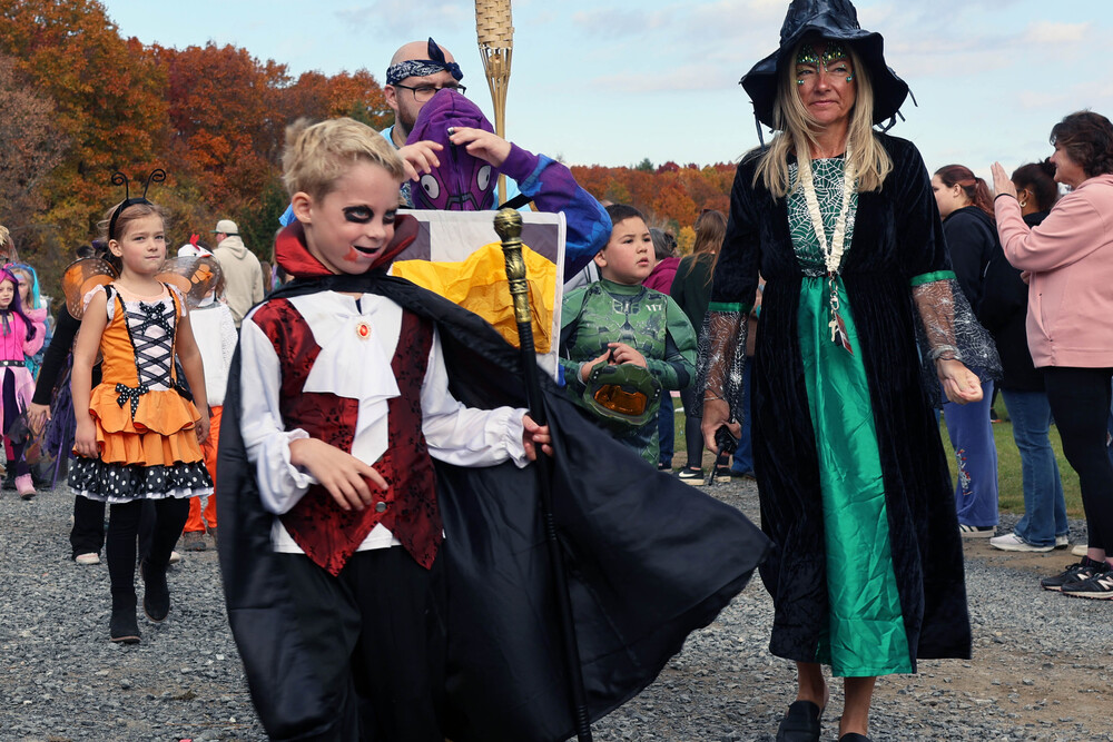 student dressed as vampire in parade