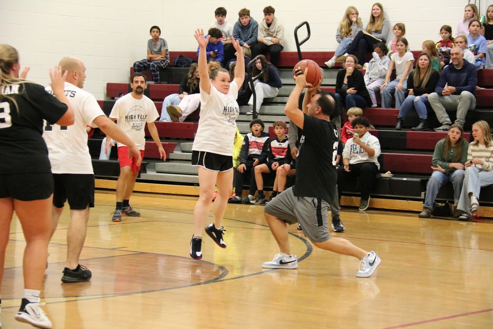 staff playing basketball