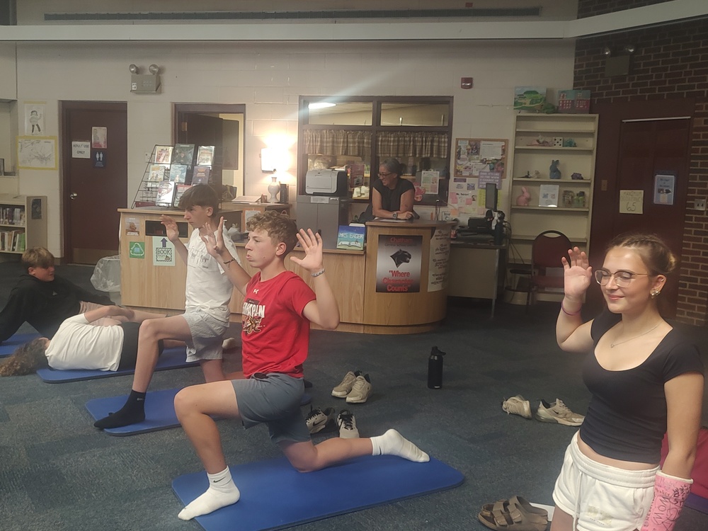 students doing yoga