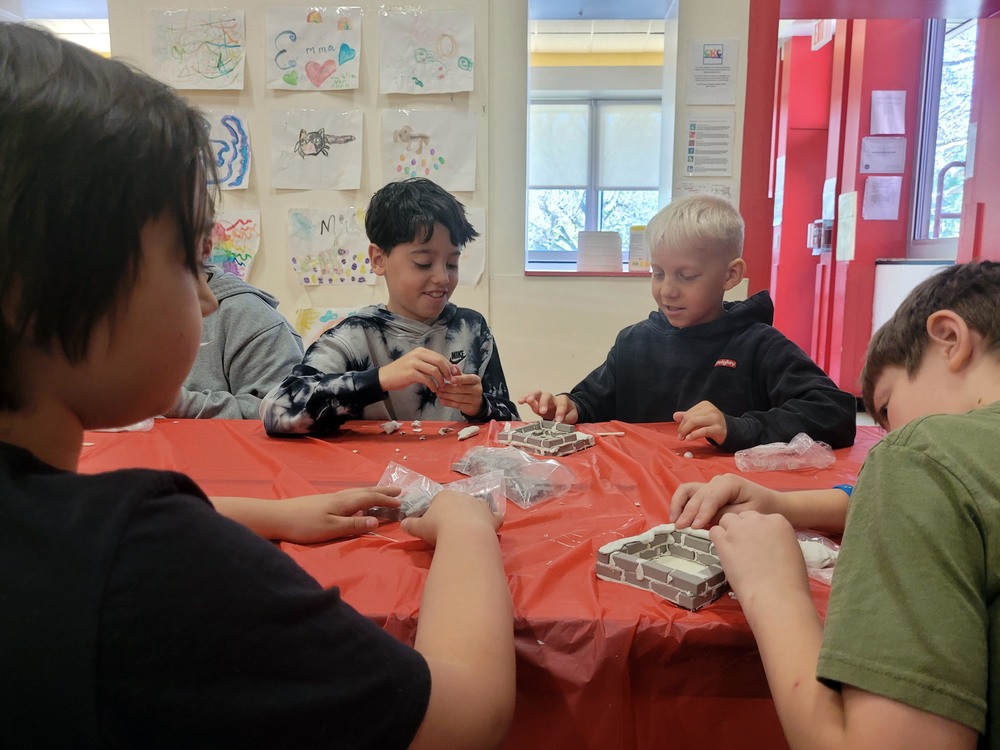 students making mini brick walls