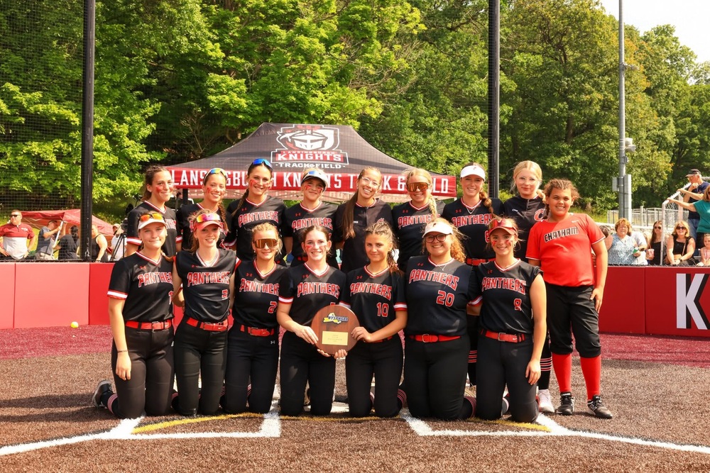 Chatham varsity softball team holding regional trophy