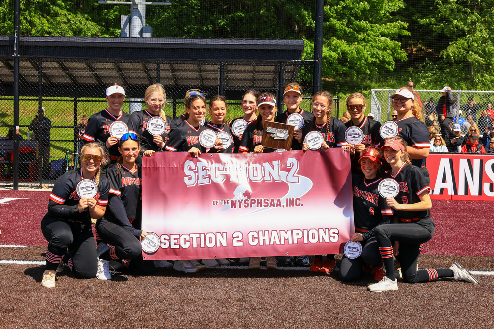 CHS softball team with Section 2 Champions banner