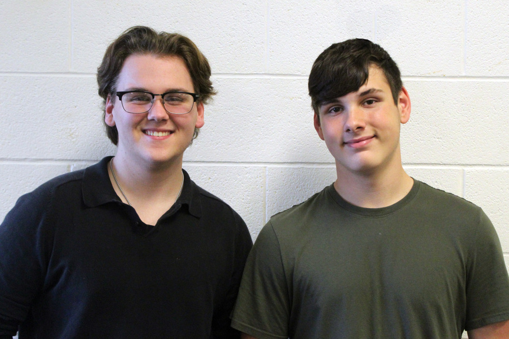 two young men smiling