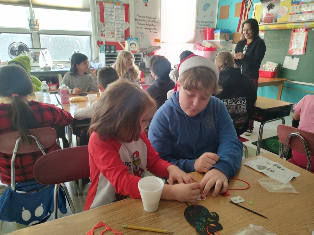boy and girl making craft