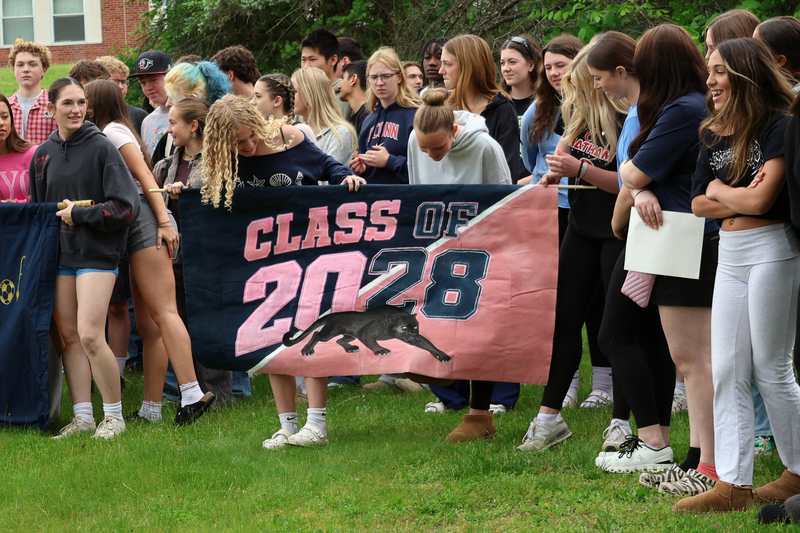 Class of 2027 unravels banner with colors of pink and black