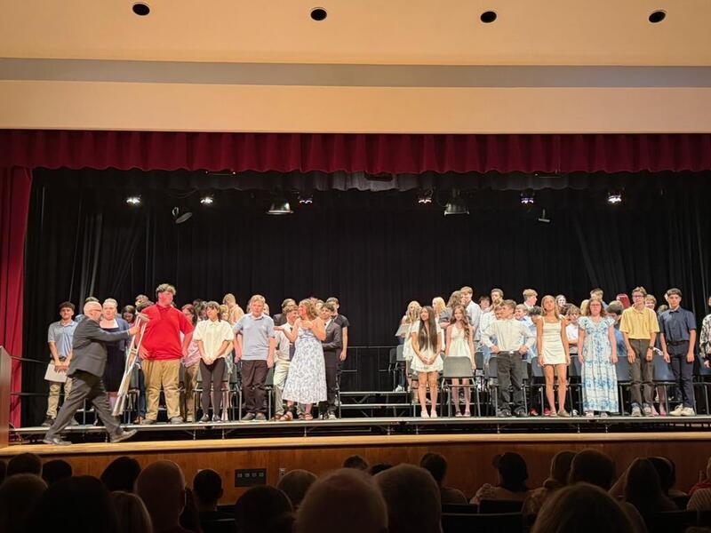 Clase of 2020 on stag during moving up ceremony