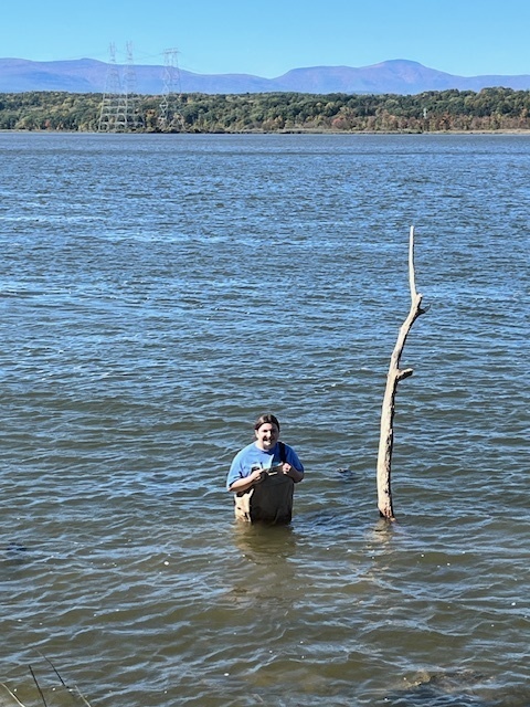 girl wading in river
