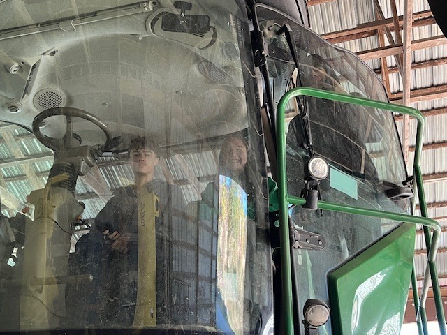 students in combine cab