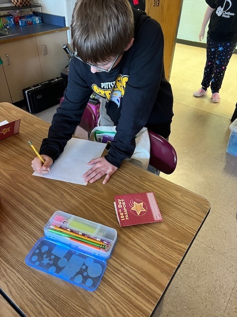 student filling out 100 day passport