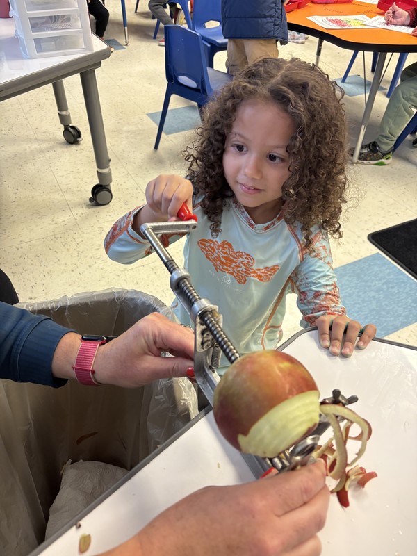 girl peeling apple