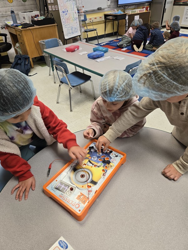 students playing operation game