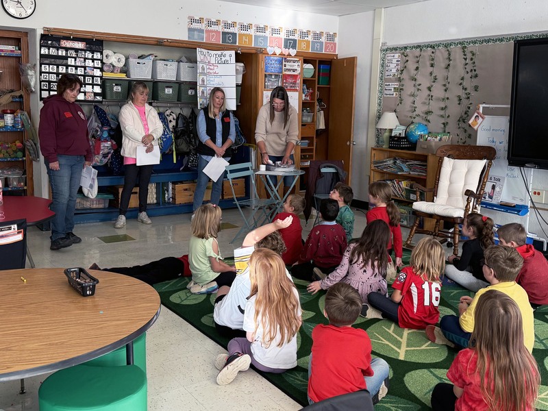 transportation staff talk to second graders