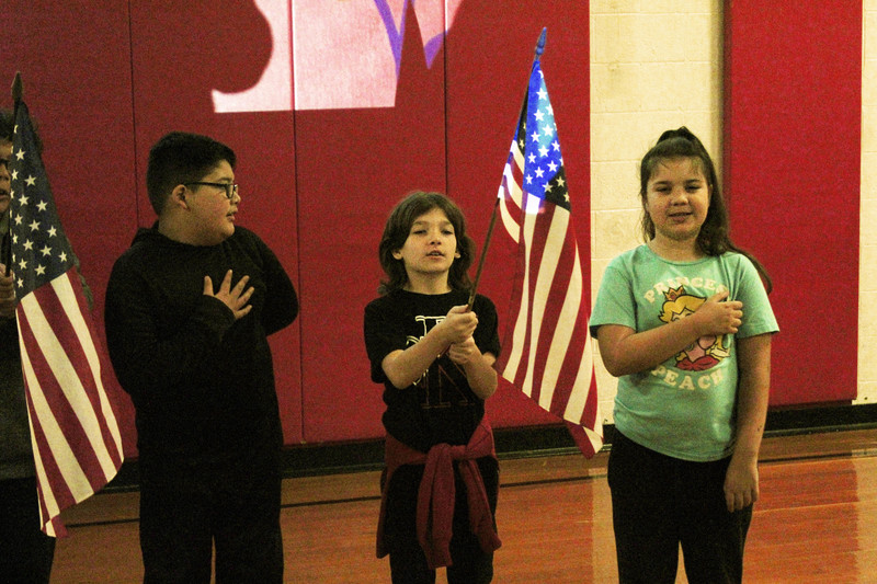 students leading Pledge of Allegiance