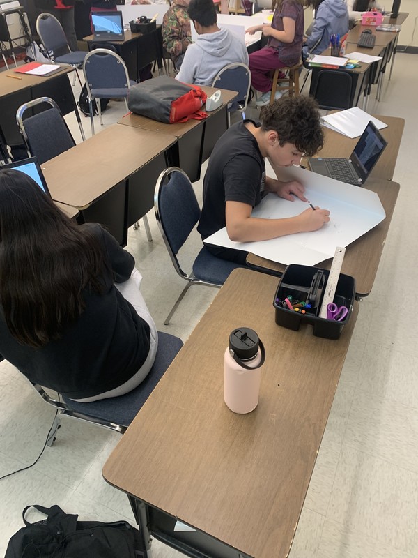 students working on project at desks
