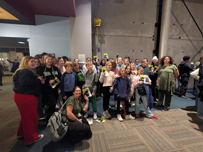 CMS Drama Club poses for photo in Proctors Theatre lobby