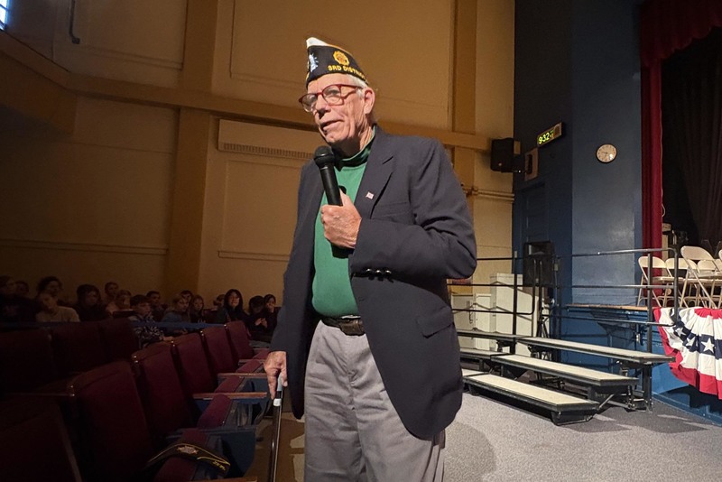Jeff French speaking in CMS auditorium