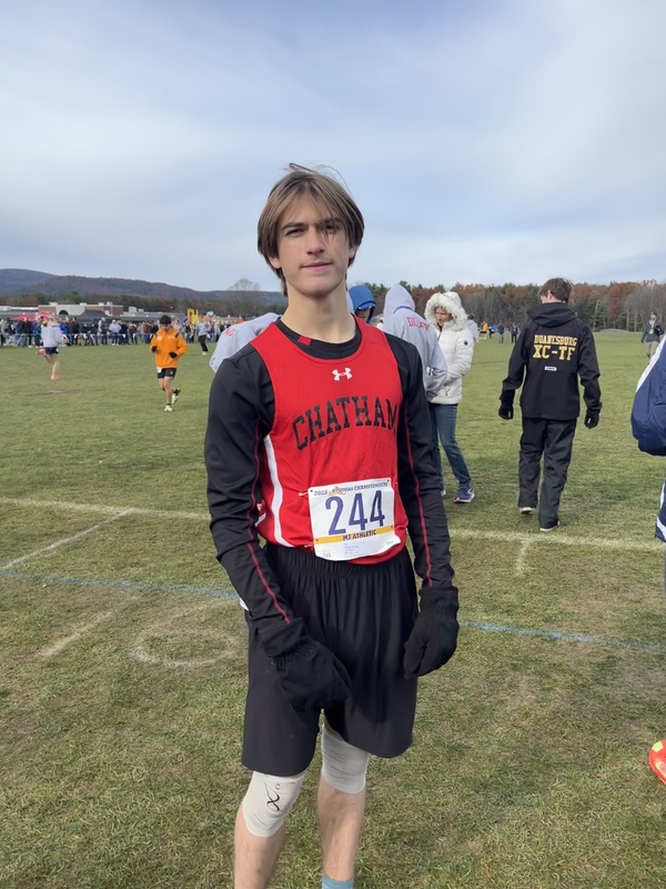 teenage boy wearing running outfit
