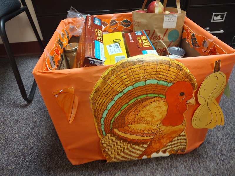 bax filled with food decorated like a turkey