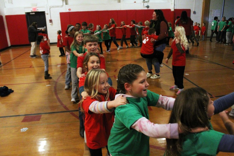 students in conga line