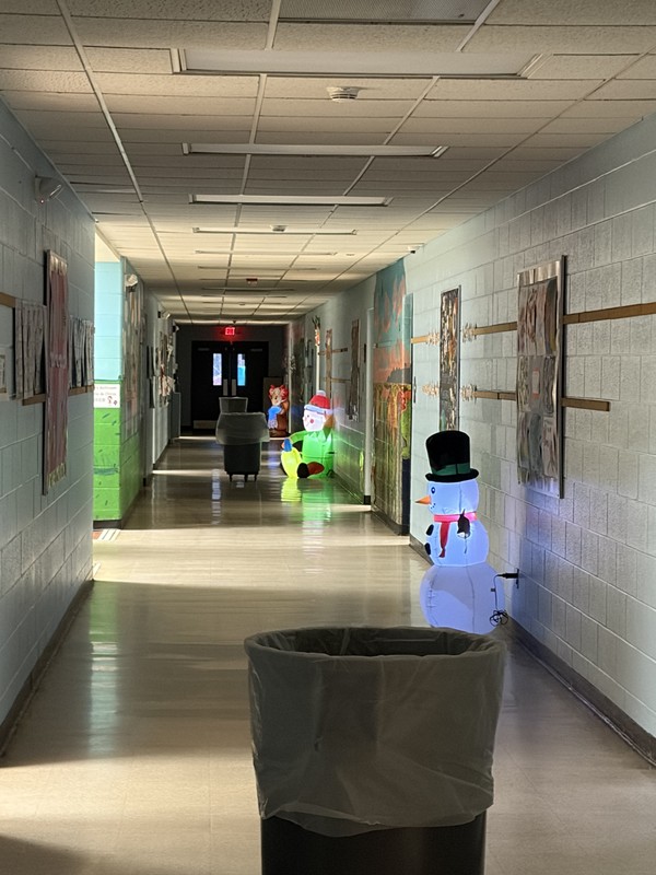 holiday blowups in hallway