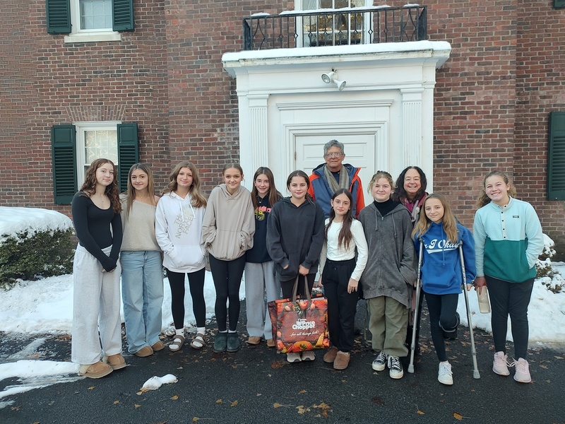 group photo of CMS Service Club outside of the Payne Home