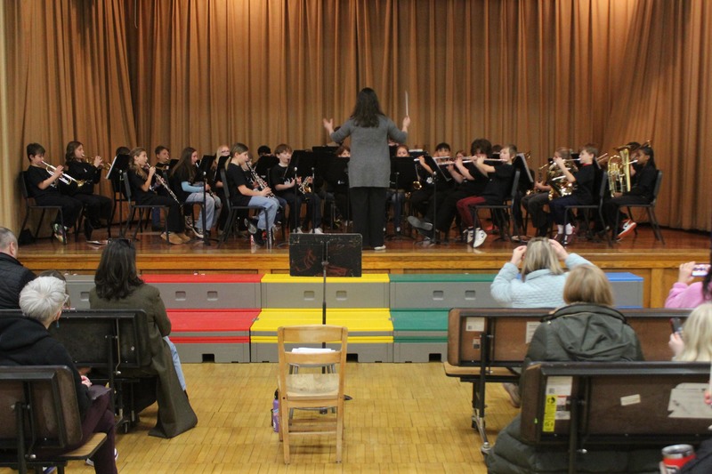 grade 4 orchestra playing on cafetorium stage