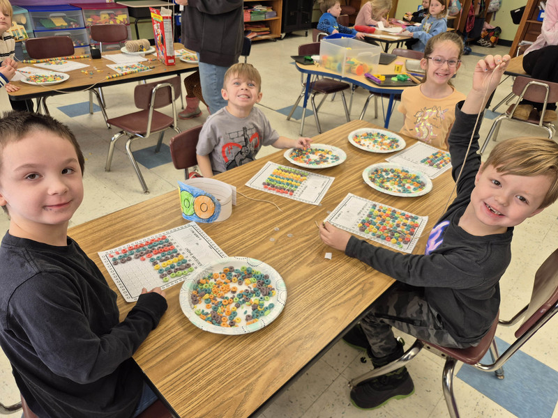 students using colorful treats to count to 100