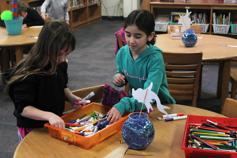 students making crafts at table