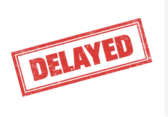 Words "delayed" in a box