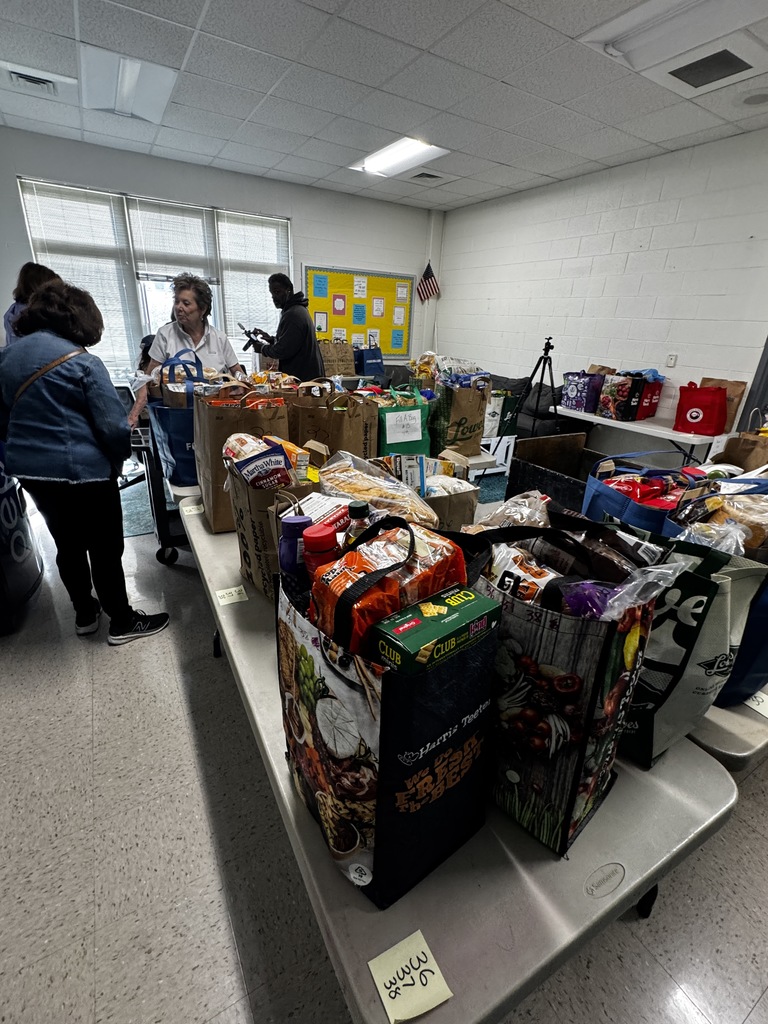 FUEL UP for Spring Break, CORA packing food for families