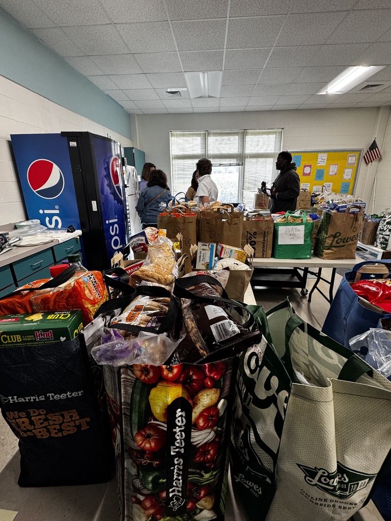FUEL UP for Spring Break, CORA packing food for families