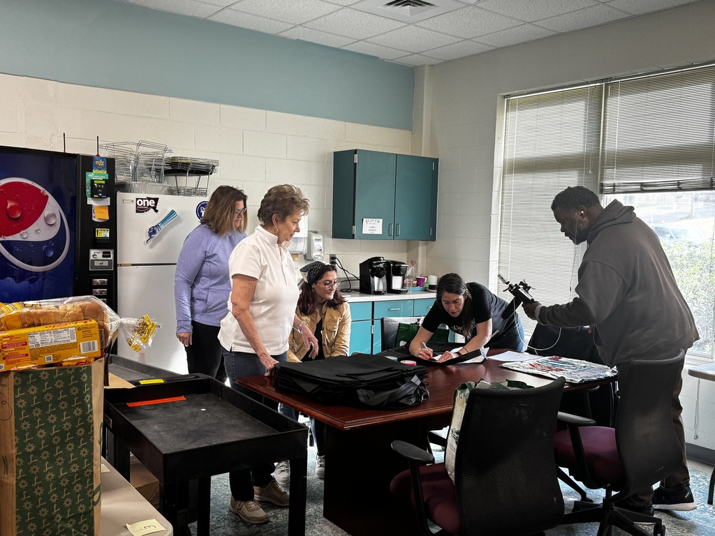 FUEL UP for Spring Break, CORA packing food for families
