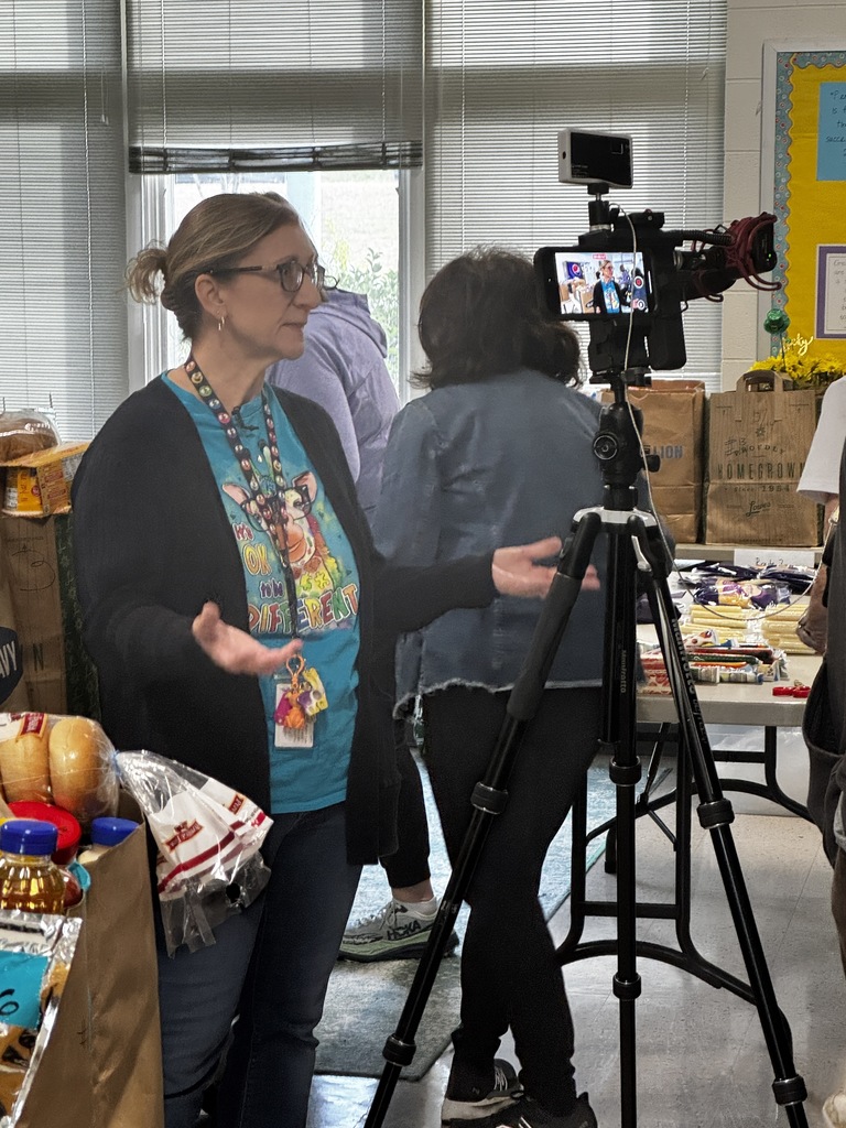 FUEL UP for Spring Break, CORA packing food for families