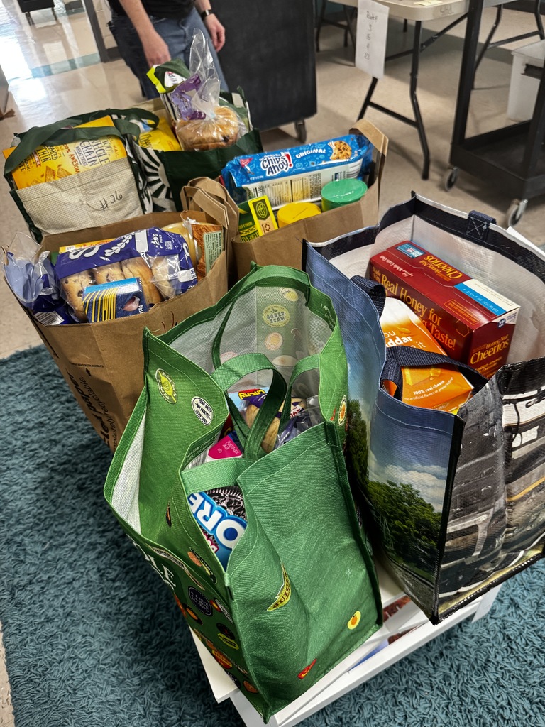 FUEL UP for Spring Break, CORA packing food for families