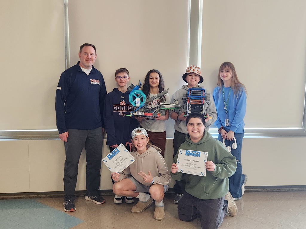 middle school students at robotic competition