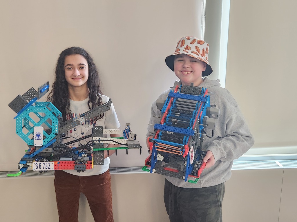 middle school students at robotic competition