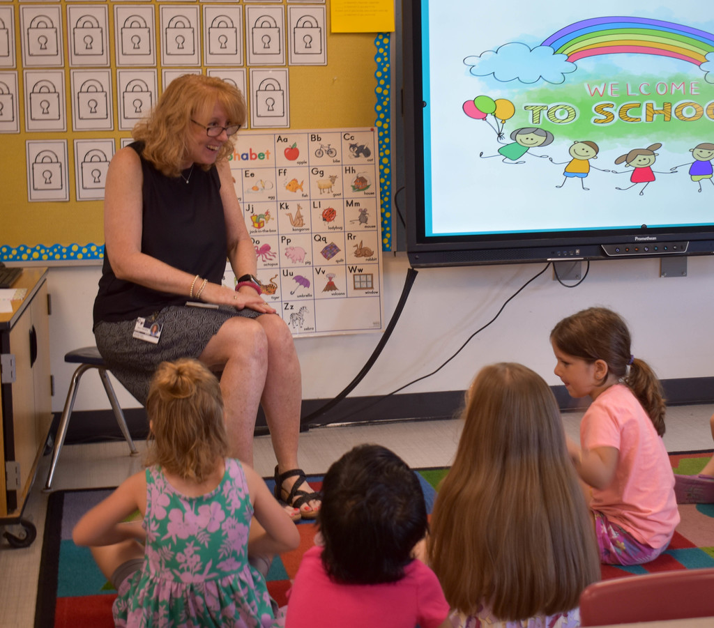 students and teacher in classroom