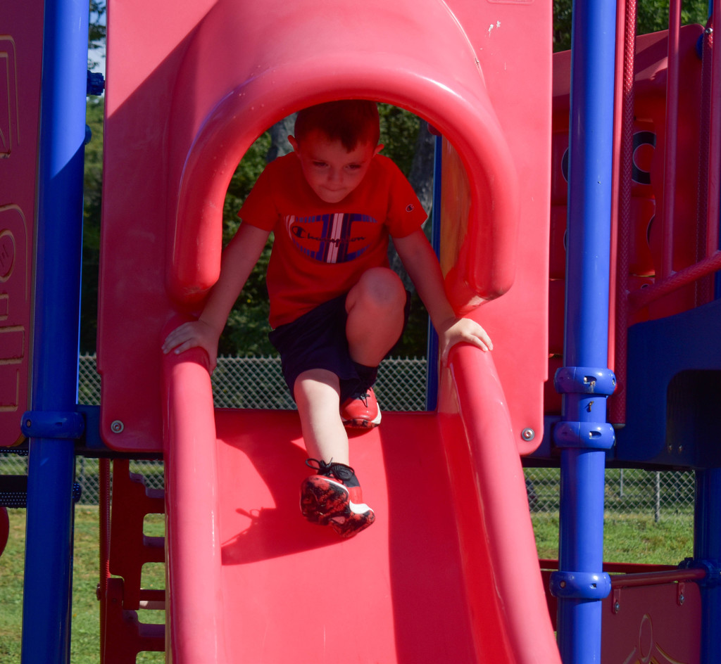 student playing on playground