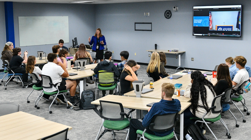 students board members at training