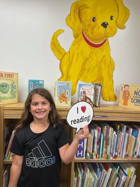 Elementary Student in library
