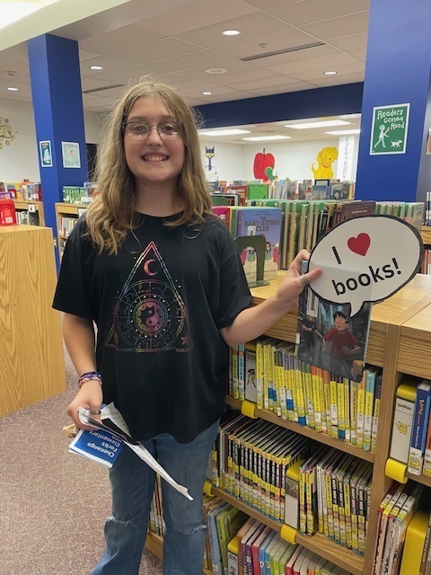 Elementary Student in library