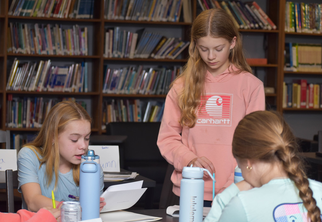 three students working together