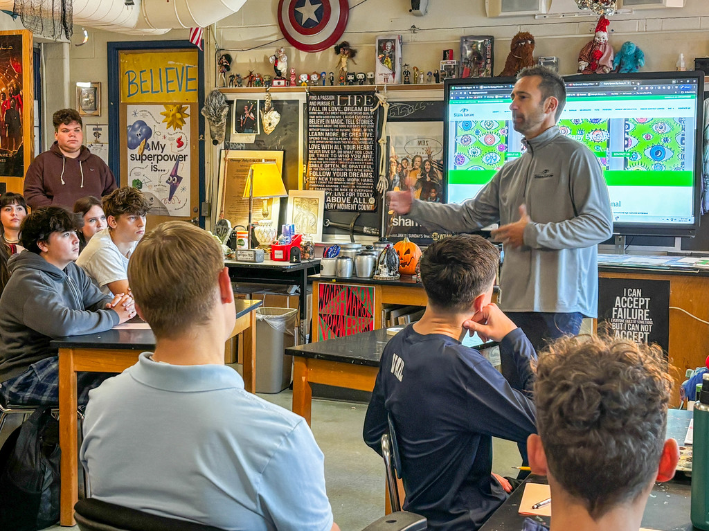 Alum speaking to class